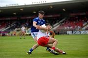10 July 2021; Darren McCurry of Tyrone in action against Cian Reilly of Cavan during the Ulster GAA Football Senior Championship quarter-final match between Tyrone and Cavan at Healy Park in Omagh, Tyrone. Photo by Stephen McCarthy/Sportsfile