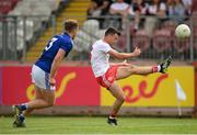 10 July 2021; Darren McCurry of Tyrone scores a point during the Ulster GAA Football Senior Championship quarter-final match between Tyrone and Cavan at Healy Park in Omagh, Tyrone. Photo by Stephen McCarthy/Sportsfile
