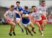 10 July 2021; Conor Smith of Cavan in action against Peter Harte, left, and Tiernan McCann of Tyrone during the Ulster GAA Football Senior Championship quarter-final match between Tyrone and Cavan at Healy Park in Omagh, Tyrone. Photo by Stephen McCarthy/Sportsfile