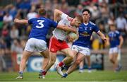 10 July 2021; Cathal McShane of Tyrone in action against Padraig Faulkner, left, and Killian Brady of Cavan during the Ulster GAA Football Senior Championship quarter-final match between Tyrone and Cavan at Healy Park in Omagh, Tyrone. Photo by Stephen McCarthy/Sportsfile