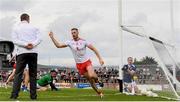 10 July 2021; Brian Kennedy of Tyrone celebrates after scoring his side's first goal during the Ulster GAA Football Senior Championship quarter-final match between Tyrone and Cavan at Healy Park in Omagh, Tyrone. Photo by Stephen McCarthy/Sportsfile