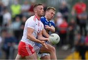 10 July 2021; Brian Kennedy of Tyrone in action against Padraig Faulkner of Cavan during the Ulster GAA Football Senior Championship quarter-final match between Tyrone and Cavan at Healy Park in Omagh, Tyrone. Photo by Stephen McCarthy/Sportsfile