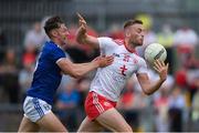 10 July 2021; Brian Kennedy of Tyrone in action against Brian O'Connell of Cavan during the Ulster GAA Football Senior Championship quarter-final match between Tyrone and Cavan at Healy Park in Omagh, Tyrone. Photo by Stephen McCarthy/Sportsfile
