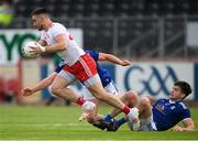 10 July 2021; Pádraig Hampsey of Tyrone in action against Thomas Galligan, right, and Oisin Pierson of Cavan during the Ulster GAA Football Senior Championship quarter-final match between Tyrone and Cavan at Healy Park in Omagh, Tyrone. Photo by Stephen McCarthy/Sportsfile