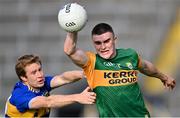 10 July 2021; Seán O’Shea of Kerry is tackled by Brian Fox of Tipperary during the Munster GAA Football Senior Championship Semi-Final match between Tipperary and Kerry at Semple Stadium in Thurles, Tipperary. Photo by Piaras Ó Mídheach/Sportsfile