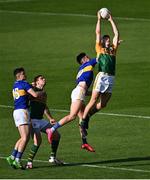 10 July 2021; Diarmuid O’Connor of Kerry, supported by team-mate David Moran, wins possession from the throw-in at the start of the first half, ahead of Conal Kennedy, right, and Michael Quinlivan of Tipperary during the Munster GAA Football Senior Championship Semi-Final match between Tipperary and Kerry at Semple Stadium in Thurles, Tipperary. Photo by Piaras Ó Mídheach/Sportsfile