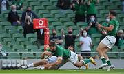 10 July 2021; Stuart McCloskey of Ireland scores a try despite the tackle of Mike Te’o of USA during the International Rugby Friendly match between Ireland and USA at the Aviva Stadium in Dublin. Photo by Brendan Moran/Sportsfile