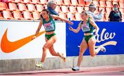 11 July 2021; Molly Scott, right, passes the baton to Aoife Lynch of Ireland as they compete in round one of the Women's 4 x 100 metres relay during day four of the European Athletics U23 Championships at the Kadriorg Stadium in Tallinn, Estonia. Photo by Marko Mumm/Sportsfile