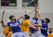 10 July 2021; Players from both teams contest a high ball during the GAA Hurling All-Ireland Senior Championship preliminary round match between Antrim and Laois at Parnell Park in Dublin. Photo by Seb Daly/Sportsfile