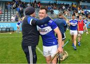 10 July 2021; Willie Dunphy of Laois and manager Seamus Plunkett after their side's victory over Antrim in their GAA Hurling All-Ireland Senior Championship preliminary round match at Parnell Park in Dublin. Photo by Seb Daly/Sportsfile