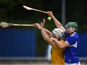 10 July 2021; Neil McManus of Antrim in action against Sean Downey of Laois during the GAA Hurling All-Ireland Senior Championship preliminary round match between Antrim and Laois at Parnell Park in Dublin. Photo by Seb Daly/Sportsfile