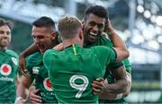 10 July 2021; Robert Baloucoune of Ireland celebrates with team-mates James Hume and Craig Casey after scoring their side's first try during the International Rugby Friendly match between Ireland and USA at the Aviva Stadium in Dublin. Photo by Brendan Moran/Sportsfile