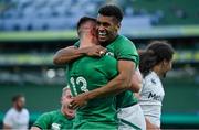 10 July 2021; Robert Baloucoune of Ireland celebrates with team-mate James Hume after scoring his side's first try during the International Rugby Friendly match between Ireland and USA at the Aviva Stadium in Dublin. Photo by Brendan Moran/Sportsfile
