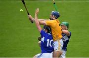 10 July 2021; Gerard Walsh of Antrim in action against Paddy Purcell, left, and Ross King of Laois during the GAA Hurling All-Ireland Senior Championship preliminary round match between Antrim and Laois at Parnell Park in Dublin. Photo by Seb Daly/Sportsfile