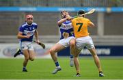 10 July 2021; Paddy Purcell of Laois is tackled by Aodhan O’Brien of Antrim during the GAA Hurling All-Ireland Senior Championship preliminary round match between Antrim and Laois at Parnell Park in Dublin. Photo by Seb Daly/Sportsfile