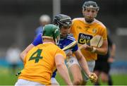 10 July 2021; Paddy Purcell of Laois in action against Stephen Rooney of Antrim during the GAA Hurling All-Ireland Senior Championship preliminary round match between Antrim and Laois at Parnell Park in Dublin. Photo by Seb Daly/Sportsfile