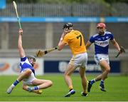 10 July 2021; Paddy Purcell of Laois is tackled by Aodhan O’Brien of Antrim during the GAA Hurling All-Ireland Senior Championship preliminary round match between Antrim and Laois at Parnell Park in Dublin. Photo by Seb Daly/Sportsfile