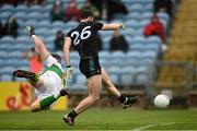 11 July 2021; Darren Coen of Mayo shoots to score his side's first goal despite the efforts of Leitrim goalkeeper Brendan Flynn during the Connacht GAA Senior Football Championship Semi-Final match between Leitrim and Mayo at Elverys MacHale Park in Castlebar, Mayo. Photo by Harry Murphy/Sportsfile