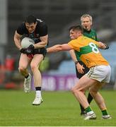 11 July 2021; Paddy Durcan of Mayo in action against Jack Gilheany of Leitrim during the Connacht GAA Senior Football Championship Semi-Final match between Leitrim and Mayo at Elverys MacHale Park in Castlebar, Mayo. Photo by Harry Murphy/Sportsfile