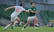 10 July 2021; Joey Carbery of Ireland in action against Luke Carty of USA during the International Rugby Friendly match between Ireland and USA at the Aviva Stadium in Dublin. Photo by Brendan Moran/Sportsfile