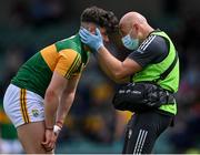 11 July 2021; Oisín Maunsell of Kerry receives medical attention from Kerry physiotherapist Ger Keane during the 2020 Electric Ireland GAA Football All-Ireland Minor Championship Semi-Final match between Roscommon and Kerry at LIT Gaelic Grounds in Limerick. Photo by Piaras Ó Mídheach/Sportsfile