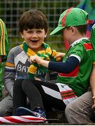 11 July 2021; Cousins Rowan Murphy, aged 7, from Lurganboy, Leitrim, left, and Oscar Murphy, aged 7, from Claremorris, Mayo, sit in the stands before the Connacht GAA Senior Football Championship Semi-Final match between Leitrim and Mayo at Elverys MacHale Park in Castlebar, Mayo. Photo by Harry Murphy/Sportsfile