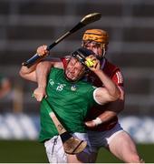 3 July 2021; Peter Casey of Limerick is tackled by Niall O’Leary of Cork during the Munster GAA Hurling Senior Championship Semi-Final match between Cork and Limerick at Semple Stadium in Thurles, Tipperary. Photo by Ray McManus/Sportsfile