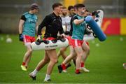 11 July 2021; Derry players warm up before the Ulster GAA Football Senior Championship Quarter-Final match between Derry and Donegal at Páirc MacCumhaill in Ballybofey, Donegal. Photo by Stephen McCarthy/Sportsfile