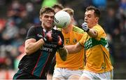 11 July 2021; Jordan Flynn of Mayo in action against Aaron Hoare, left, and James Mitchell of Leitrim during the Connacht GAA Senior Football Championship Semi-Final match between Leitrim and Mayo at Elverys MacHale Park in Castlebar, Mayo. Photo by Harry Murphy/Sportsfile