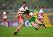 11 July 2021; Ryan McHugh of Donegal is tackled by Shane McGuigan of Derry during the Ulster GAA Football Senior Championship Quarter-Final match between Derry and Donegal at Páirc MacCumhaill in Ballybofey, Donegal. Photo by Stephen McCarthy/Sportsfile