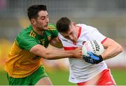 11 July 2021; Gareth McKinless of Derry in action against Ryan McHugh of Donegal during the Ulster GAA Football Senior Championship Quarter-Final match between Derry and Donegal at Páirc MacCumhaill in Ballybofey, Donegal. Photo by Stephen McCarthy/Sportsfile