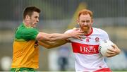 11 July 2021; Conor Glass of Derry and Eoghan Ban Gallagher during the Ulster GAA Football Senior Championship Quarter-Final match between Derry and Donegal at Páirc MacCumhaill in Ballybofey, Donegal. Photo by Stephen McCarthy/Sportsfile