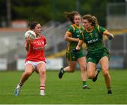 10 July 2021; Eimear Scally of Cork in action against Orla Byrne of Meath during the TG4 All-Ireland Senior Ladies Football Championship Group 2 Round 1 match between Cork and Meath at St Brendan's Park in Birr, Offaly. Photo by Ray McManus/Sportsfile