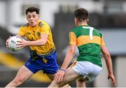 11 July 2021; Eoin Ward of Roscommon in action against Killian O'Sullivan of Kerry during the 2020 Electric Ireland GAA Football All-Ireland Minor Championship Semi-Final match between Roscommon and Kerry at LIT Gaelic Grounds in Limerick. Photo by Piaras Ó Mídheach/Sportsfile