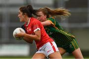 10 July 2021; Ciara O'Sullivan of Cork is tackled by Aoibhin Cleary of Meath during the TG4 All-Ireland Senior Ladies Football Championship Group 2 Round 1 match between Cork and Meath at St Brendan's Park in Birr, Offaly. Photo by Ray McManus/Sportsfile