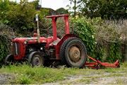 10 July 2021; A tractor, sporting the red and green colours of the local Birr GAA Club, before the TG4 All-Ireland Senior Ladies Football Championship Group 2 Round 1 match between Cork and Meath at St Brendan's Park in Birr, Offaly. Photo by Ray McManus/Sportsfile