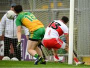 11 July 2021; Benny Heron of Derry has an attempt on goal which was adjudged not to have crossed the line during the Ulster GAA Football Senior Championship Quarter-Final match between Derry and Donegal at Páirc MacCumhaill in Ballybofey, Donegal. Photo by Stephen McCarthy/Sportsfile
