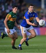 10 July 2021; Robbie Kiely of Tipperary in action against Mike Breen of Kerry during the Munster GAA Football Senior Championship Semi-Final match between Tipperary and Kerry at Semple Stadium in Thurles, Tipperary. Photo by Piaras Ó Mídheach/Sportsfile