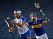 12 July 2021; Paddy Leevy of Waterford in action against Dara Stakelum of Tipperary during the Munster GAA Hurling U20 Championship Quarter-Final match between Tipperary and Waterford at Semple Stadium in Thurles, Tipperary. Photo by Piaras Ó Mídheach/Sportsfile