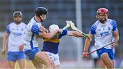 12 July 2021; John Campion of Tipperary in action against Cathrach Daly, left, and Ronan Power of Waterford during the Munster GAA Hurling U20 Championship Quarter-Final match between Tipperary and Waterford at Semple Stadium in Thurles, Tipperary. Photo by Piaras Ó Mídheach/Sportsfile