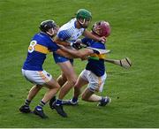 12 July 2021; Michael Kiely of Waterford in action against Max Hackett, left, and Keith Ryan of Tipperary during the Munster GAA Hurling U20 Championship Quarter-Final match between Tipperary and Waterford at Semple Stadium in Thurles, Tipperary. Photo by Piaras Ó Mídheach/Sportsfile