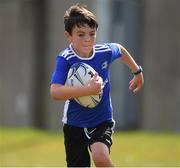 13 July 2021; Christian Megannety, age 7, in action during the Bank of Ireland Leinster Rugby Summer Camp at Greystones RFC in Greystones, Wicklow. Photo by Matt Browne/Sportsfile