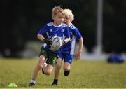 13 July 2021; Sam Byrne, age 7, in action during the Bank of Ireland Leinster Rugby Summer Camp at Greystones RFC in Greystones, Wicklow. Photo by Matt Browne/Sportsfile