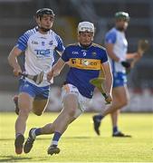 12 July 2021; John Campion of Tipperary in action against Kevin Mahony of Waterford during the Munster GAA Hurling U20 Championship Quarter-Final match between Tipperary and Waterford at Semple Stadium in Thurles, Tipperary. Photo by Piaras Ó Mídheach/Sportsfile