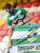 13 July 2021; A Shamrock Rovers supporter places his flag before the UEFA Champions League first qualifying round second leg match between Shamrock Rovers and Slovan Bratislava at Tallaght Stadium in Dublin. Photo by Stephen McCarthy/Sportsfile