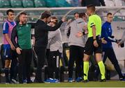 13 July 2021; Shamrock Rovers manager Stephen Bradley and strength & conditioning coach Darren Dillon, left, express their opinions to referee Mario Zebec followig the UEFA Champions League first qualifying round second leg match between Shamrock Rovers and Slovan Bratislava at Tallaght Stadium in Dublin. Photo by Stephen McCarthy/Sportsfile