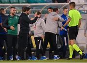13 July 2021; Shamrock Rovers manager Stephen Bradley and strength & conditioning coach Darren Dillon, left, express their opinions to referee Mario Zebec followig the UEFA Champions League first qualifying round second leg match between Shamrock Rovers and Slovan Bratislava at Tallaght Stadium in Dublin. Photo by Stephen McCarthy/Sportsfile
