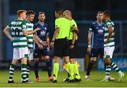 13 July 2021; Rory Gaffney, left, and Shamrock Rovers captain Ronan Finn protest to referee Mario Zebec after the UEFA Champions League first qualifying round second leg match between Shamrock Rovers and Slovan Bratislava at Tallaght Stadium in Dublin. Photo by Eóin Noonan/Sportsfile
