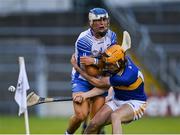 12 July 2021; Paddy Leevy of Waterford in action against Conor Hennessy of Tipperary during the Munster GAA Hurling U20 Championship Quarter-Final match between Tipperary and Waterford at Semple Stadium in Thurles, Tipperary. Photo by Piaras Ó Mídheach/Sportsfile