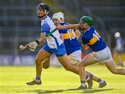 12 July 2021; Mark Fitzgerald of Waterford in action against James Devanney, right, and Colm Fogarty of Tipperary during the Munster GAA Hurling U20 Championship Quarter-Final match between Tipperary and Waterford at Semple Stadium in Thurles, Tipperary. Photo by Piaras Ó Mídheach/Sportsfile
